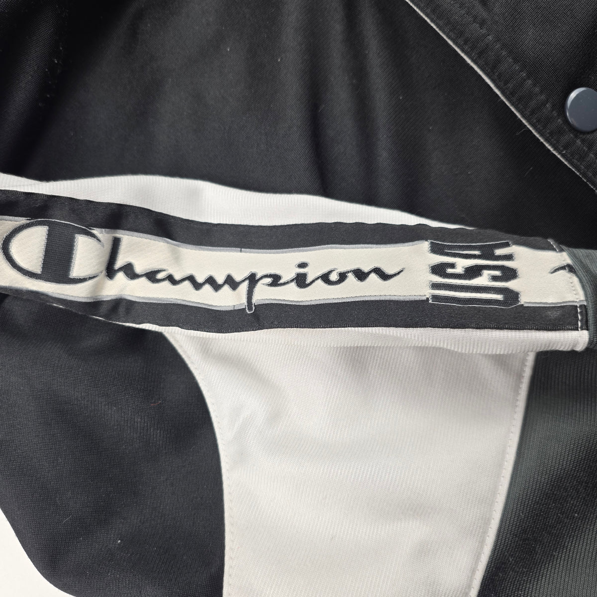 Champion USA Kapuzenjacke – Vintage (schwarz/weiß) – Gr. M