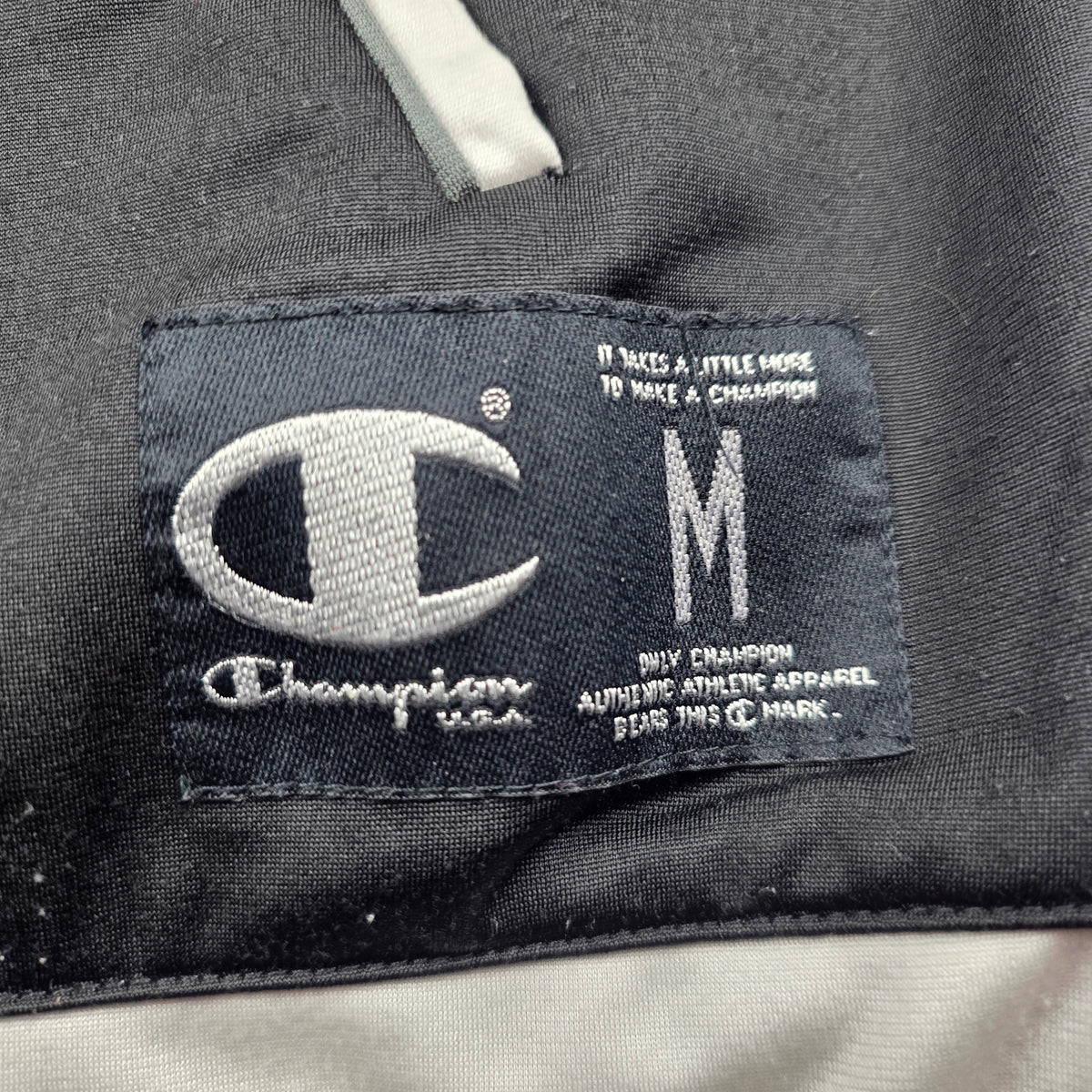 Champion USA Kapuzenjacke – Vintage (schwarz/weiß) – Gr. M